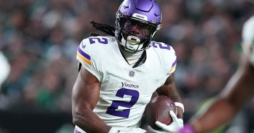 Alexander Mattison of the Minnesota Vikings runs the ball against the Philadelphia Eagles at Lincoln Financial Field on Thursday in Philadelphia.