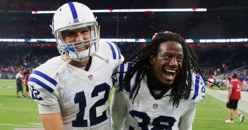 Sergio Brown, right, walks off the field with quarterback Andrew Luck after the Indianapolis Colts defeated the Houston Texans 33-28 at NRG Stadium in Houston on Oct. 9, 2014.