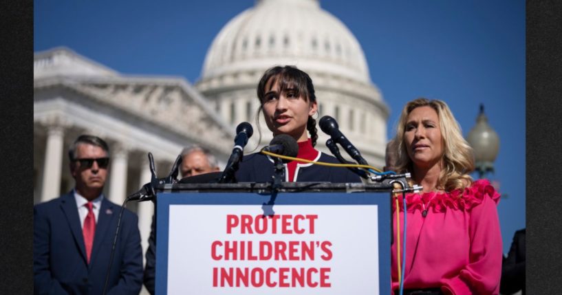 Chloe Cole is seen at a conference on Capitol Hill in September 2022, with Georgia GOP Rep. Marjorie Taylor Greene, right. Cole is one of several detransitioners who are suing medical practitioners for performing irreversible sex-change surgery on them as children.