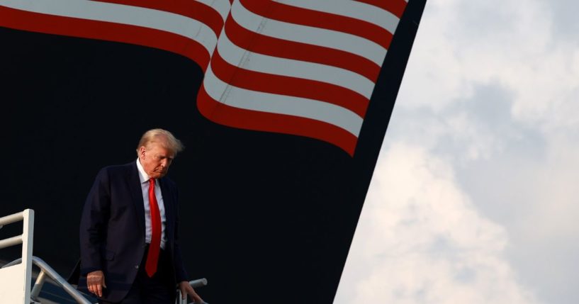 Former President Donald Trump arrives at Atlanta Hartsfield-Jackson International Airport on Aug. 24 in Atlanta.