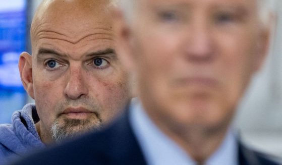 Sen. John Fetterman looks on as President Joe Biden delivers remarks in Philadelphia on June 17.