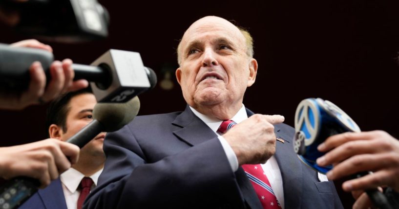 Former Mayor Rudy Giuliani speaking to reporters