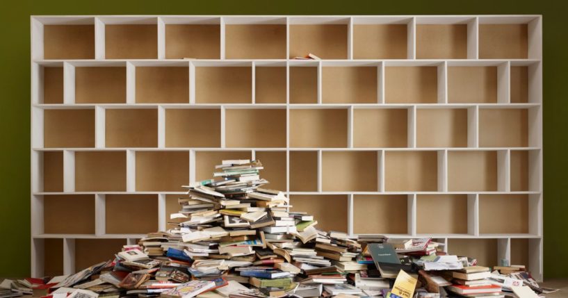 The above stock image is of empty bookshelves.