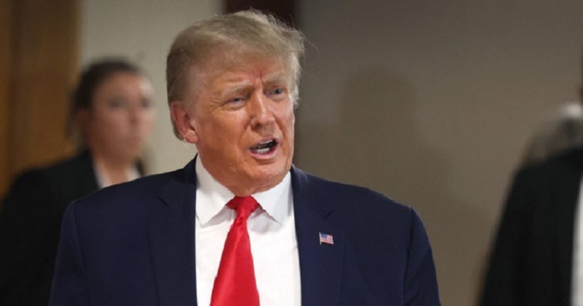 Former President Donald Trump arrives for a "Commit To Caucus" rally on Wednesday at the Jackson County Fairgrounds in Maquoketa, Iowa.