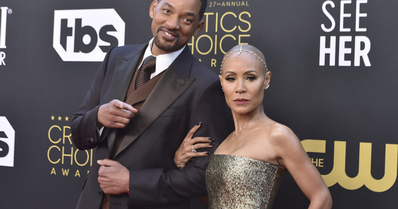 Will Smith, left, and Jada Pinkett Smith, seen at a March 2022 event, have lived what Pinkett-Smith says are “completely separate lives” since 2016. She made the revelation in an interview with Hoda Kotb.