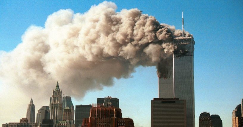 Smoke pours from the twin towers of the World Trade Center after they were hit by two hijacked airliners in a terrorist attack Sept. 11, 2001, in New York City.