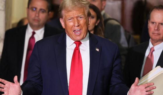 Former President Donald Trump speaks as the court takes a lunch break during his civil fraud trial at New York State Supreme Court in New York City on Tuesday.