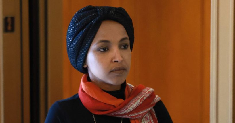 Minnesota Democratic Rep. Ilhan Omar walks to the House chambers Tuesday at the U.S. Capitol in Washington, D.C.