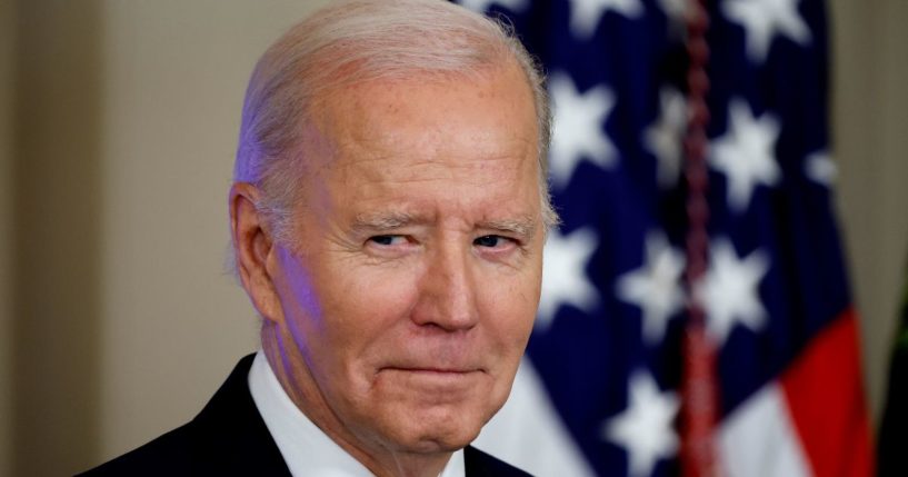 President Joe Biden watches as Vice President Kamala Harris speaks before he signs an executive order on artificial intelligence in the East Room of the White House on Monday. A new report shows that a property Biden sold almost three decades ago in Greenville, Delaware, has appreciated in value only slightly.