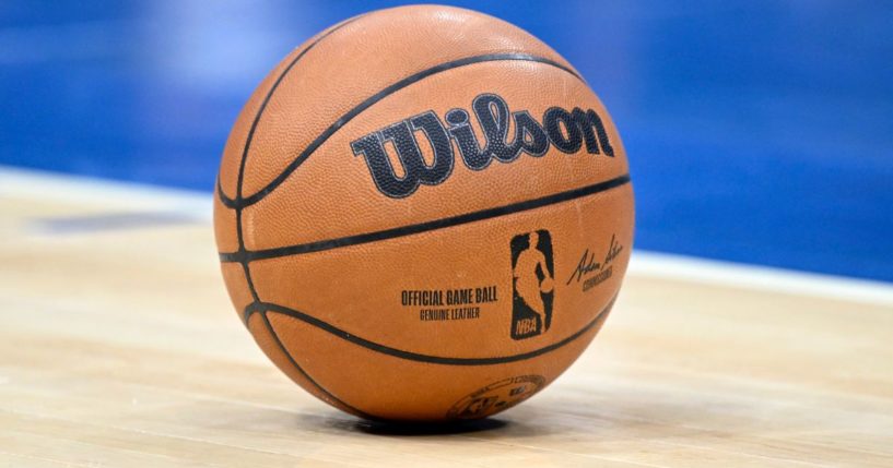 The NBA logo is displayed on a basketball during the game between the Washington Wizards and the Caharlotte Hornets in Washington, D.C., on Nov. 20, 2022. Recently, the NBA's Los Angeles Lakers faced backlash online after posting about an upcoming "pride" night event.