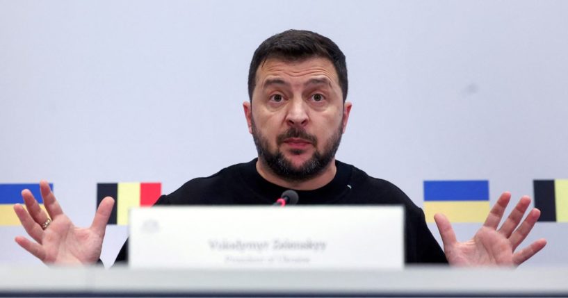 Ukraine President Volodymyr Zelenskyy gestures during a news conference in Brussels on Oct. 11.