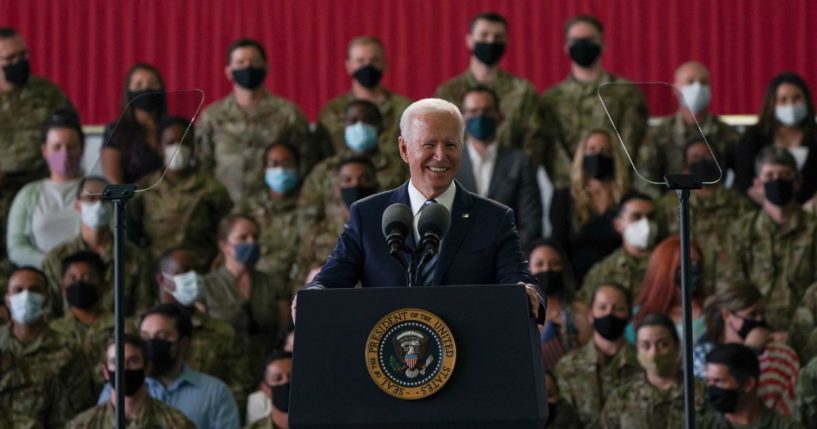 President Joe Biden addresses US Air Force personnel at RAF Mildenhall in Suffolk, ahead of the G7 summit in Cornwall, on June 9, 2021, in Mildenhall, England.