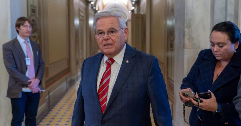 Sen. Bob Menendez of New Jersey departs the Senate floor in the Capitol on Sept. 28 in Washington.