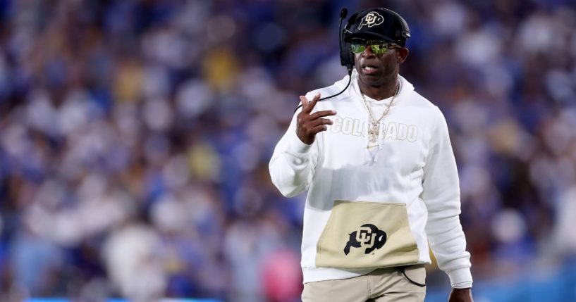 Head coach Deion Sanders of the Colorado Buffaloes looks on from the sidelines during the first half of a game against the UCLA Bruins at Rose Bowl Stadium on Saturday in Pasadena, California.