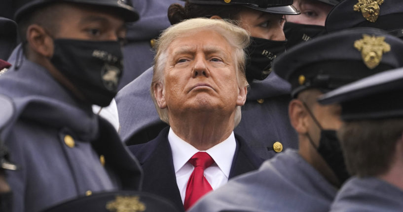 Then-President Donald Trump watches the first half of the 121st Army-Navy football game at the United State Military Academy in West Point, New York, on Dec. 12, 2020.