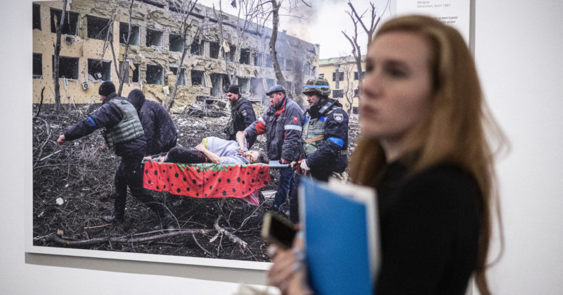 Photograph titled "Mariupol Maternity Hospital Aistrike" is on display at the opening of the World Press Photo 2023 exhibition at the Hungarian National Museum in Budapest, Hungary, on Sept. 21. The director of the Hungarian National Museum was fired for displaying LGBT content that violated the 2021 "child protection" law.