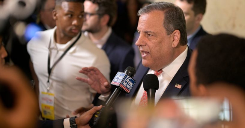 Republican presidential candidate and former New Jersey Gov. Chris Christie answers questions from reporters after speaking at the Republican Party of Florida Freedom Summit Saturday in Kissimmee, Florida.