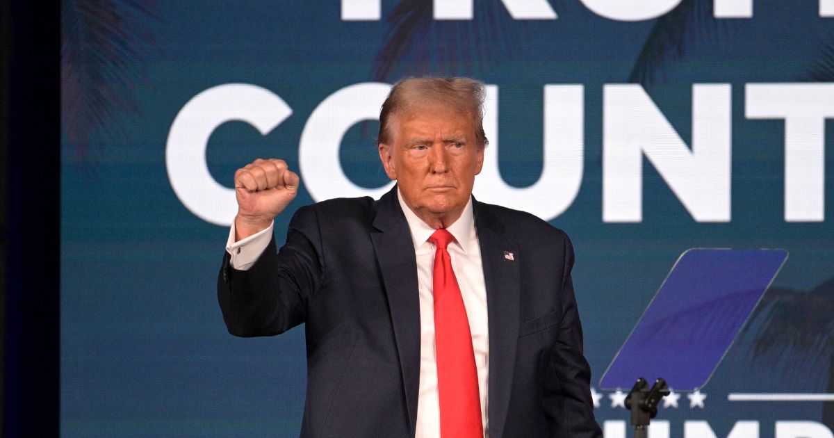 Donald Trump on stage at a Republican summit in Florida