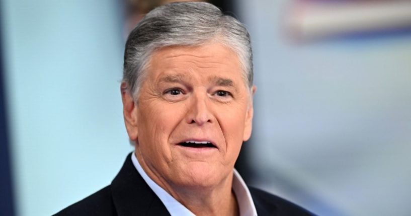 Sean Hannity listens during a taping of "Hannity" at Fox News Channel Studios in New York on Sept. 13.