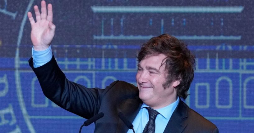 Argentine President-elect Javier Milei waves during his victory speech after being elected president in a runoff election in Buenos Aires, Argentina, Nov. 19.