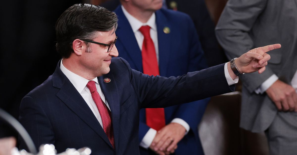 Rep. Mike Johnson points after being elected speaker of the House at the U.S. Capitol on Oct. 25 in Washington, D.C.