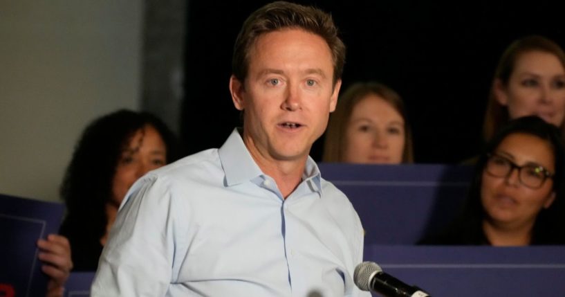 Mike Johnston makes a point during a news conference to launch a campaign for an affordable housing measure on the November general election ballot on Sept. 13, 2022, in Aurora, Colorado. Now mayor of Denver, Johnston has had his vehicle stolen twice.