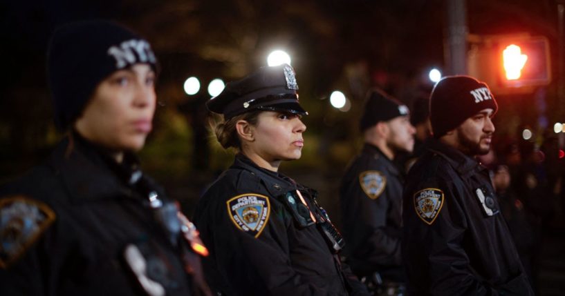 New York Police Department officers stand guard during a rally in the Brooklyn borough of New York City on Nov. 18.