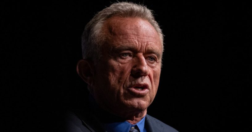 Independent presidential candidate Robert F. Kennedy Jr. speaks during a campaign event in Miami, Florida, on Oct. 12. A report Wednesday explained why Kennedy flew on Jeffrey Epstein's private jet in 1993.