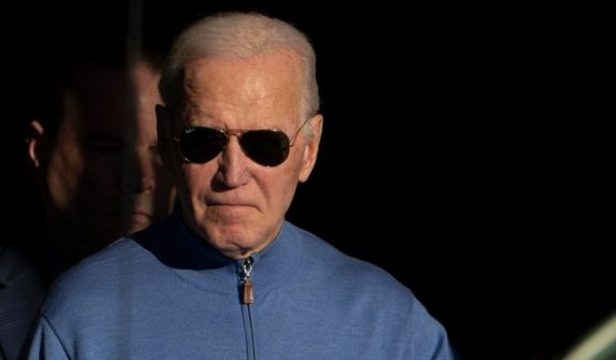 President Joe Biden walks out of Jos A. Bank in Greenville, Delaware, on Saturday.