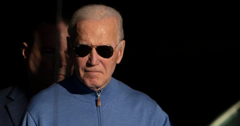 President Joe Biden walks out of Jos A. Bank in Greenville, Delaware, on Saturday.