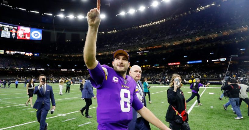 Kirk Cousins #8 of the Minnesota Vikings celebrates after defeating the New Orleans Saints 26-20 during overtime in the NFC Wild Card Playoff game at Mercedes Benz Superdome on Jan. 5, 2020, in New Orleans.