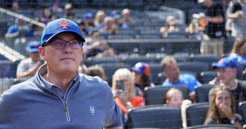 New York Mets owner Steve Cohen is seen at a baseball game between the Mets and the Cincinnati Reds on Sept. 17. Cohen's Mets finished 2023 with a tax payroll of $374.7 million, according to figures finalized by Major League Baseball on Thursday and obtained by The Associated Press.