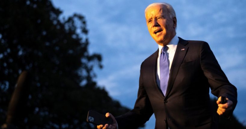 President Joe Biden speaks to reporters as he arrives on the South Lawn of the White House in Washington on Oct. 15, 2021.