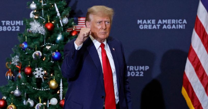 Former President Donald Trump gestures at the end of a campaign event in Waterloo, Iowa, on Dec. 19.