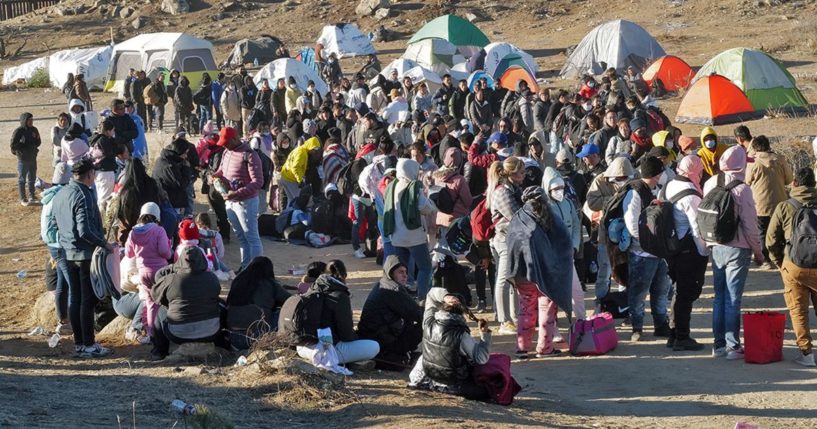 Migrants attempt to cross in to the U.S. from Mexico at the border in Jacumba Hot Springs, California, Dec. 17.