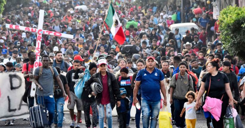 Migrants take part in a caravan headed towards the U.S.-Mexico border in Tapachula, Mexico, on Sunday.