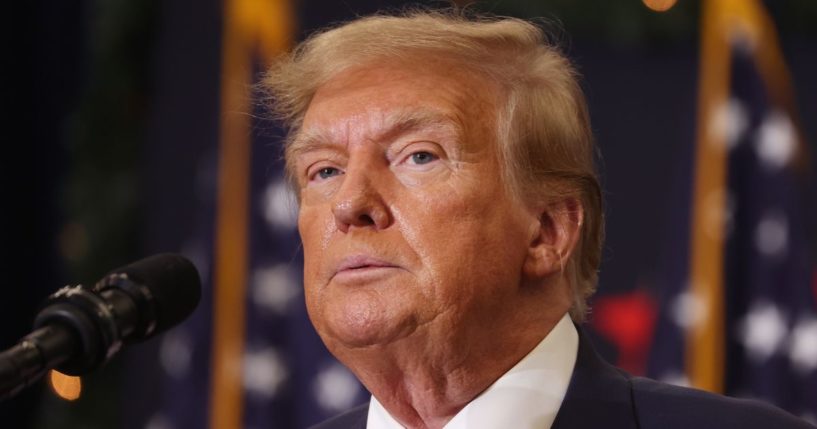 Republican presidential candidate and former U.S. President Donald Trump looks on during a campaign event in Waterloo, Iowa, on Tuesday.