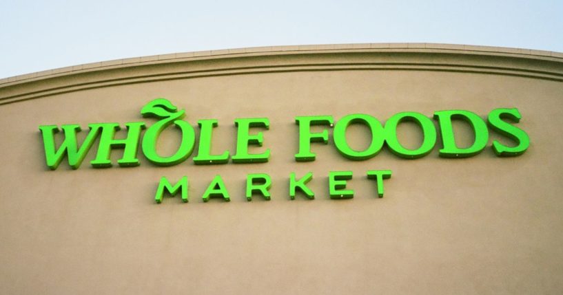 A National Labor Relations Board judge ruled in favor of Whole Foods Market in a case defending the chain's disciplining of employees for displaying Black Lives Matter slogans at work.