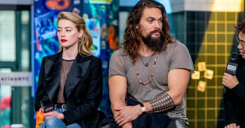 Actress Amber Heard and actor Jason Momoa discuss the 2018 "Aquaman" film in a December 2018 file photo at the Build Studio in New York City.