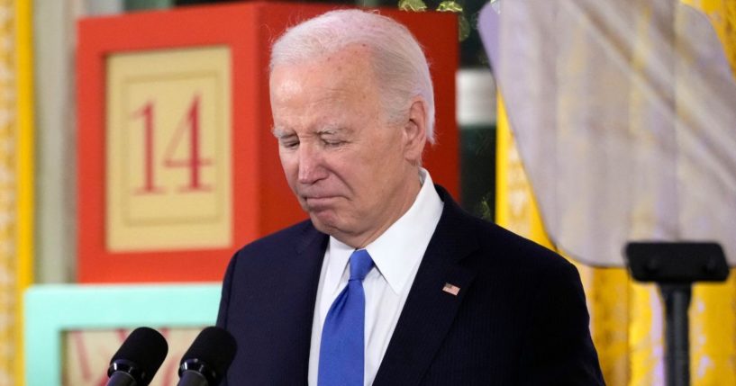 President Joe Biden pauses as he speaks during a Hanukkah reception in the East Room of the White House in Washington, D.C., on Monday.