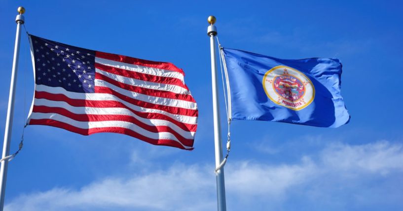 The above stock image is of the U.S. flag and the Minnesota flag.