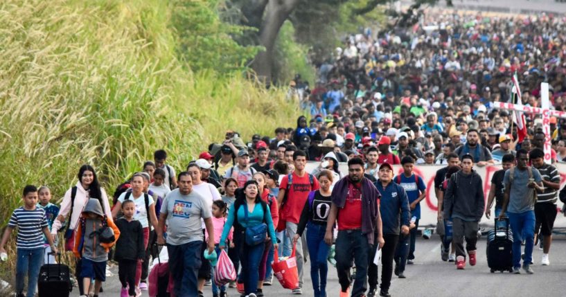 A caravan of migrants walks toward the border with the U.S. in Tapachula, Chiapas, Mexico, on Sunday.