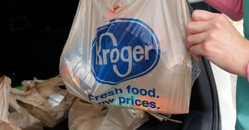 A customer removes her purchases at a Kroger grocery store in Flowood, Mississippi.