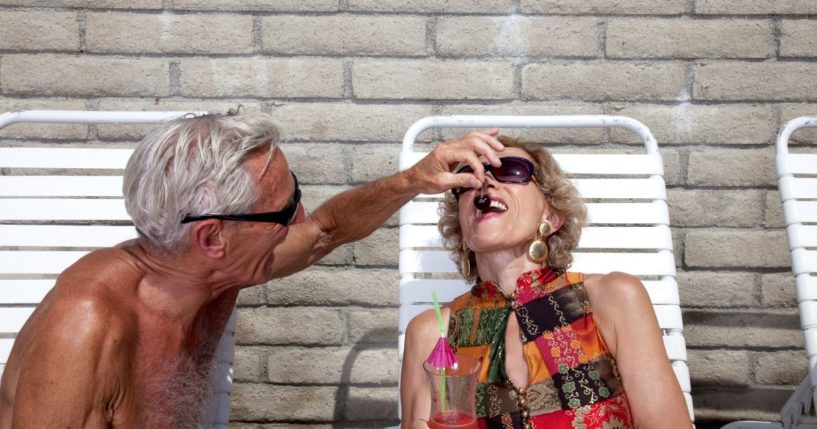 The above stock image is of two elderly people at the pool.