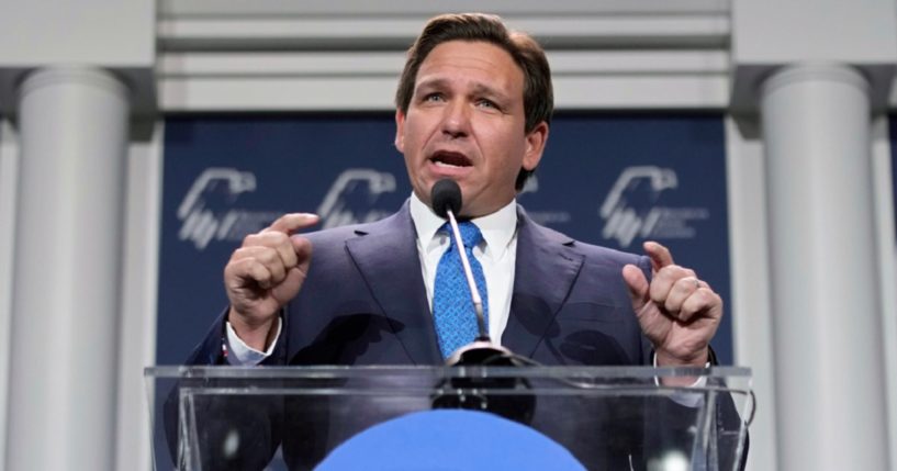 Florida Gov. Ron DeSantis, pictured in a file photo from November 2022, signed a bill in 2021 banning boys from playing on girls' teams in the Sunshine State.