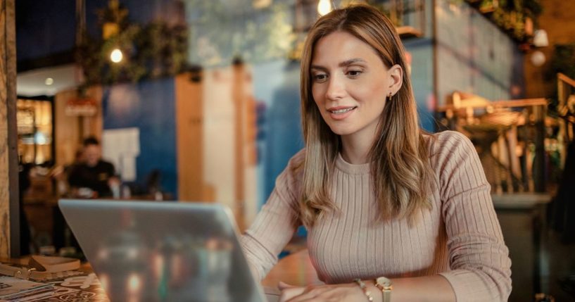 a woman using a laptop