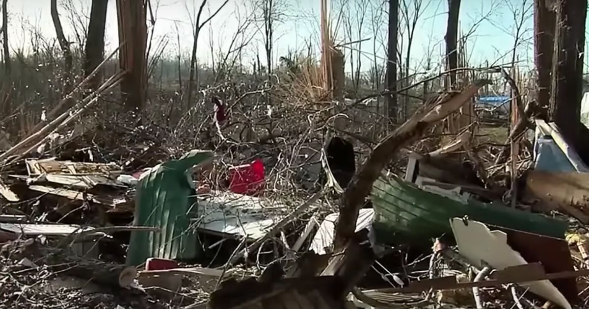 This YouTube screen shot shows the wreckage of a home where an infant was swept up in a tornado in Clarksville, Tennessee, and survived.