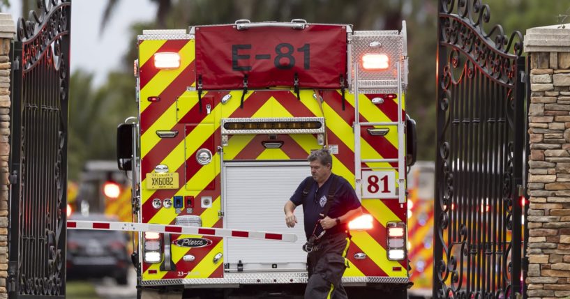 First responders work an active fire at a home belonging to Miami Dolphins wide receiver Tyreek Hill on Wednesday in Southwest Ranches, Florida.