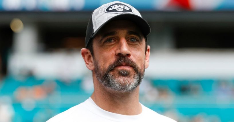 Aaron Rodgers of the New York Jets smiles prior to a game against the Miami Dolphins in Miami Gardens, Florida, on Dec. 17.