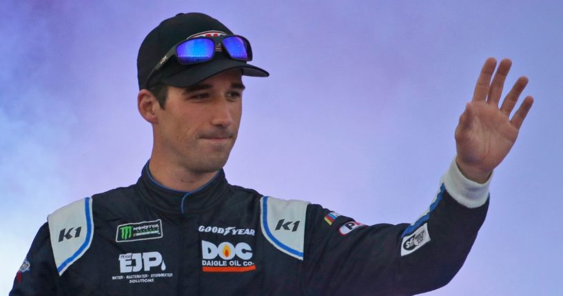 Austin Theriault greets fans in Richmond, Virginia, in a 2019 photo. The NASCAR driver-turned-politician is trying to flip a Main congressional seat red.